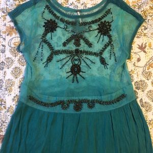 Turquoise free people top.